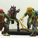 Illustration for article titled First look at the action figures of Michael Bays emTMNT/em